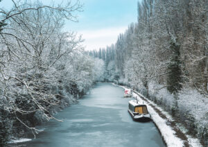 narrow boat on the bridgewater canal during cold weather in england