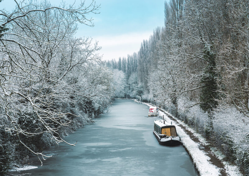 narrow boat on the bridgewater canal during cold weather in england